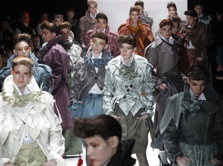 Gloomy And Conservative Styles Shown At Russian Fashion Week Reflect Current Mood Of Society