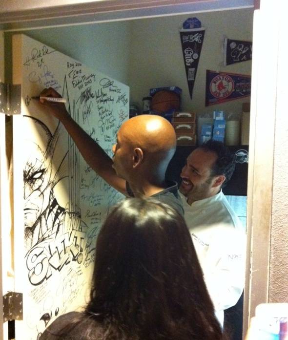Dave Chappelle with Chef Barry sighing N9NE's shake down door 6.27.12