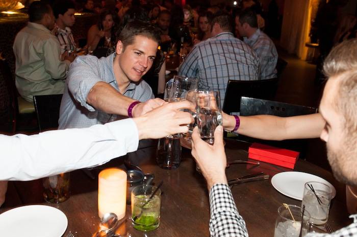Jason Kennedy toast with Whole World Water at Tao. Photos: Brenton Ho/Powers Imagery