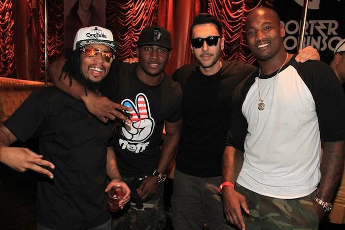 Lil Jon, Reggie Bush, Cedric Gervais and Shaun Phillips behind Encore Beach Club’s DJ booth inside Surrender Nightclub. Photos: Amanda Nowak