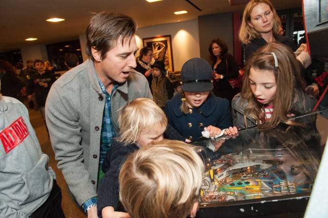Jonny Moseley and kids enjoy some Holiday Heroes fun Credit: Drew Altizer Photography