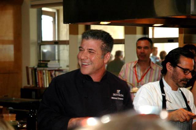 Chef Michael Chiarello cooking in his home