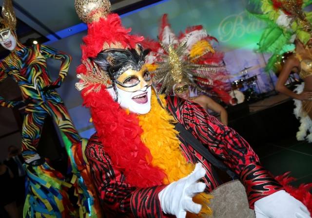 Stilt walkers on the dance floor