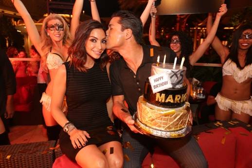 Mario Lopez gives his wife a kiss on the cheek at XS Nightclub. Photos: Karl Larson and Danny Mahoney