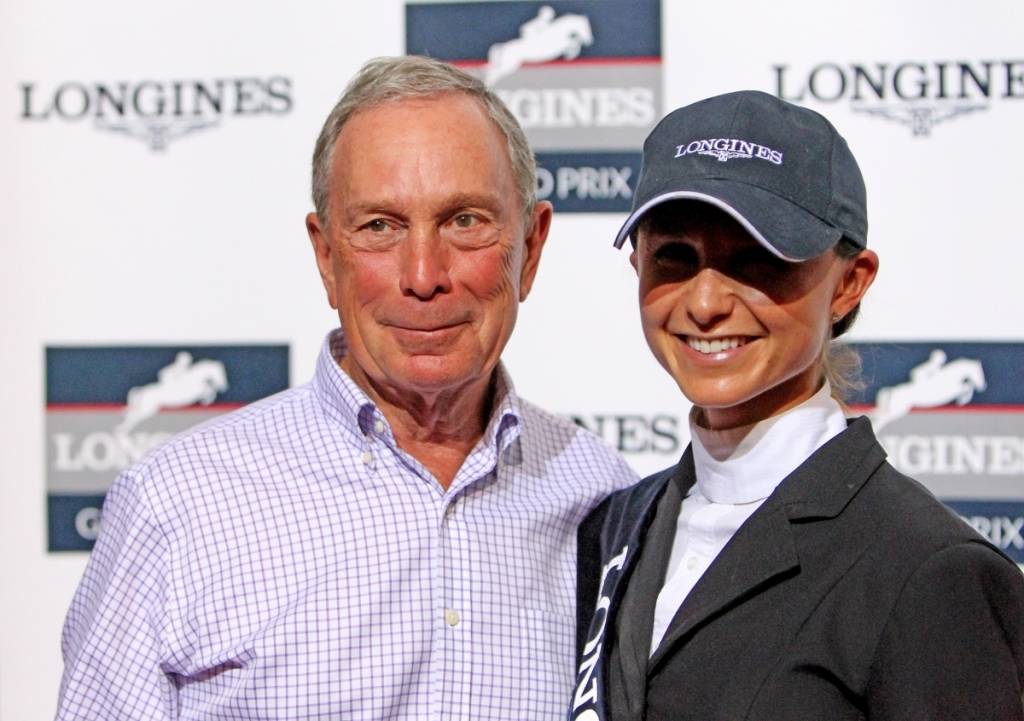 Former New York Mayor Michael Bloomberg poses with his daughter third place finisher Georgina Bloomberg