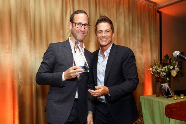 Richard Weitz and Rob Lowe pose with the Legacy Award 