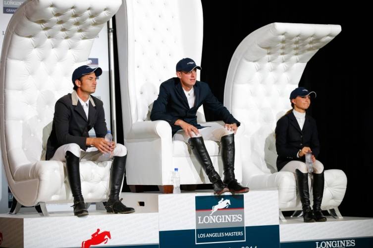 Second place finisher Steve Guerdat of Switzerland, first place finisher Jos Verlooy of Belgium and third place finisher Georgina Bloomberg